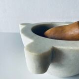 Old marble mortar with wooden pestle
