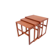 Nest tables in 1960s style, in gel-stained teak.