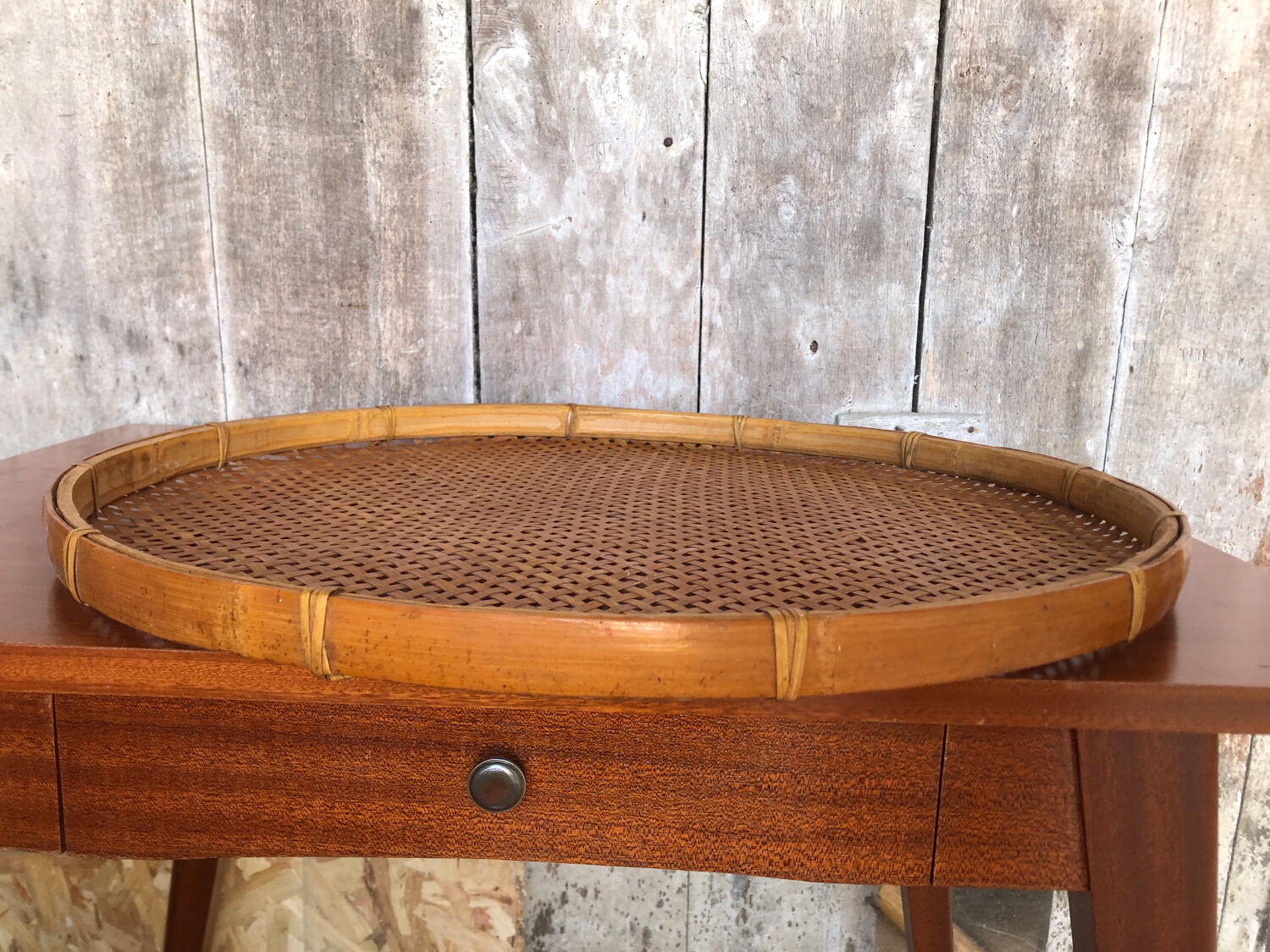 Old vintage braided wicker sieve