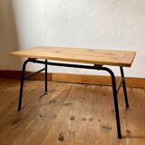 Coffee table with a pine top, tubular metal base, 1950s.