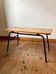 Coffee table with a pine top, tubular metal base, 1950s.