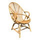 Fauteuil vintage en rotin de forme ovoïde.