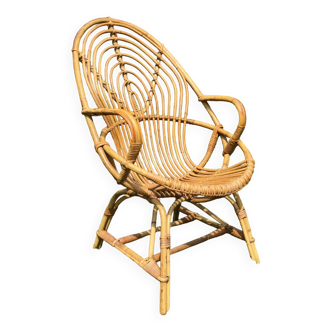 Vintage ovoid-shaped rattan armchair.