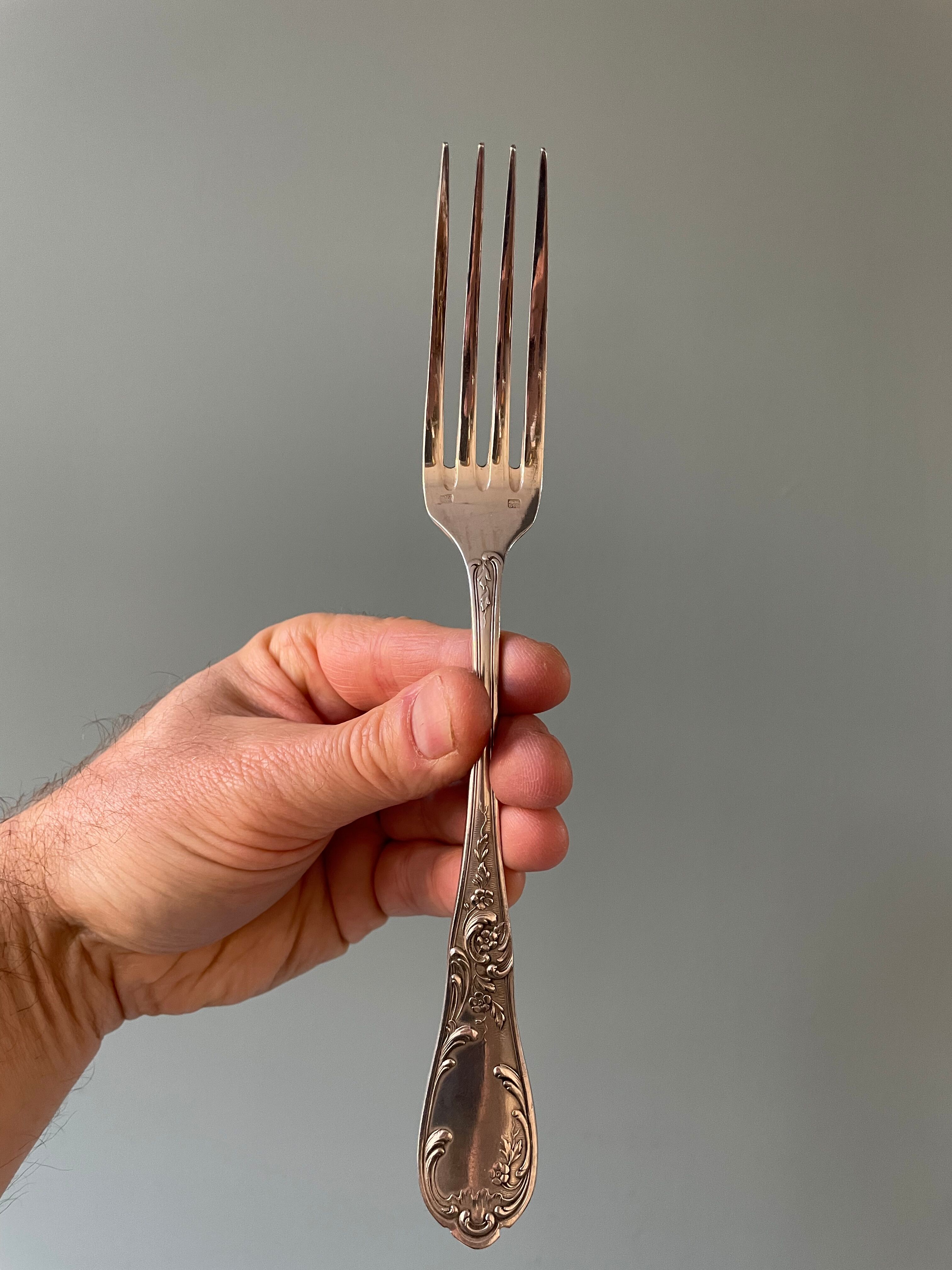 Series of 21 antique silver metal table forks