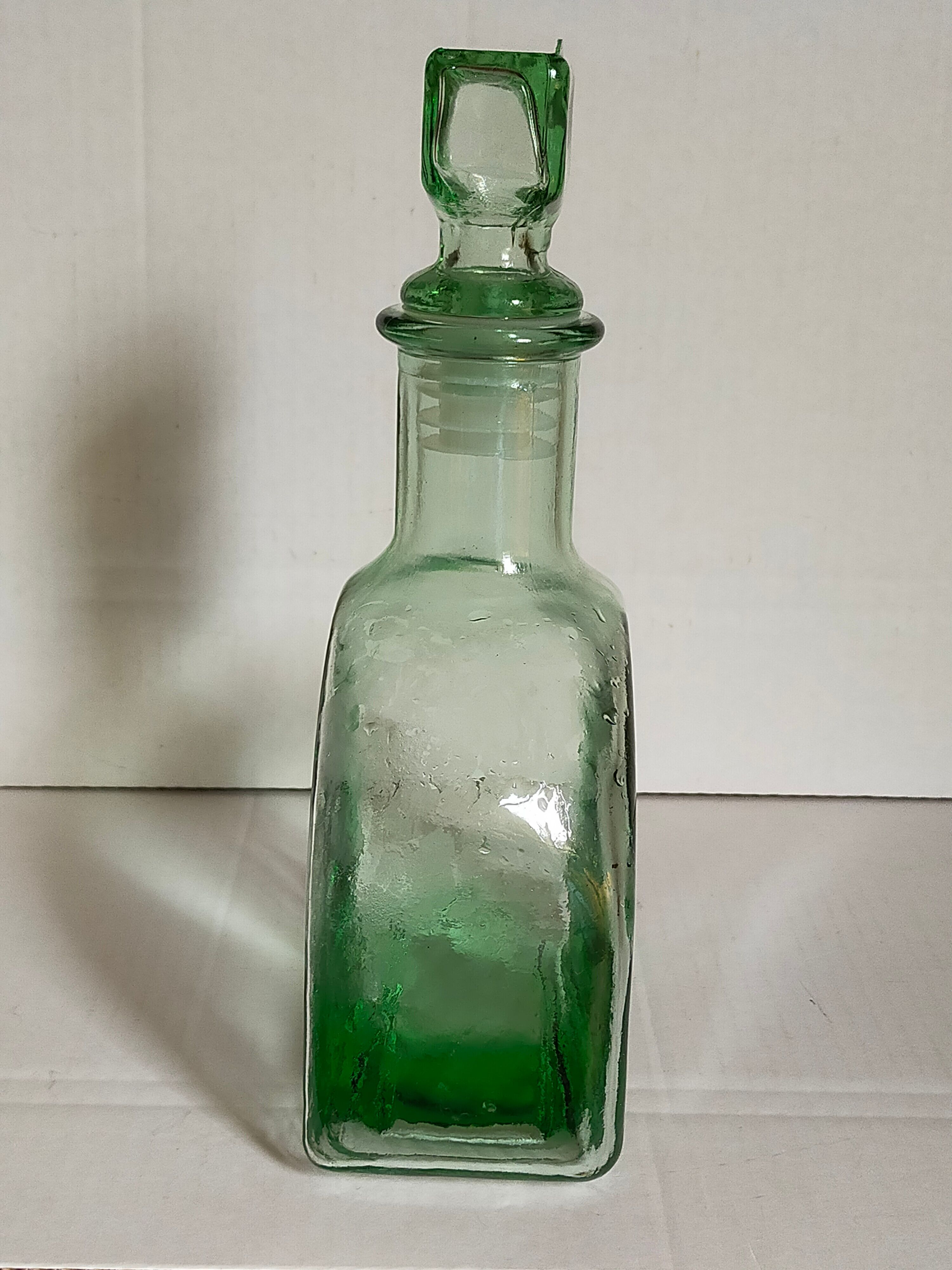 Vintage green glass whiskey decanter