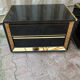 Two lacquered bedside tables.