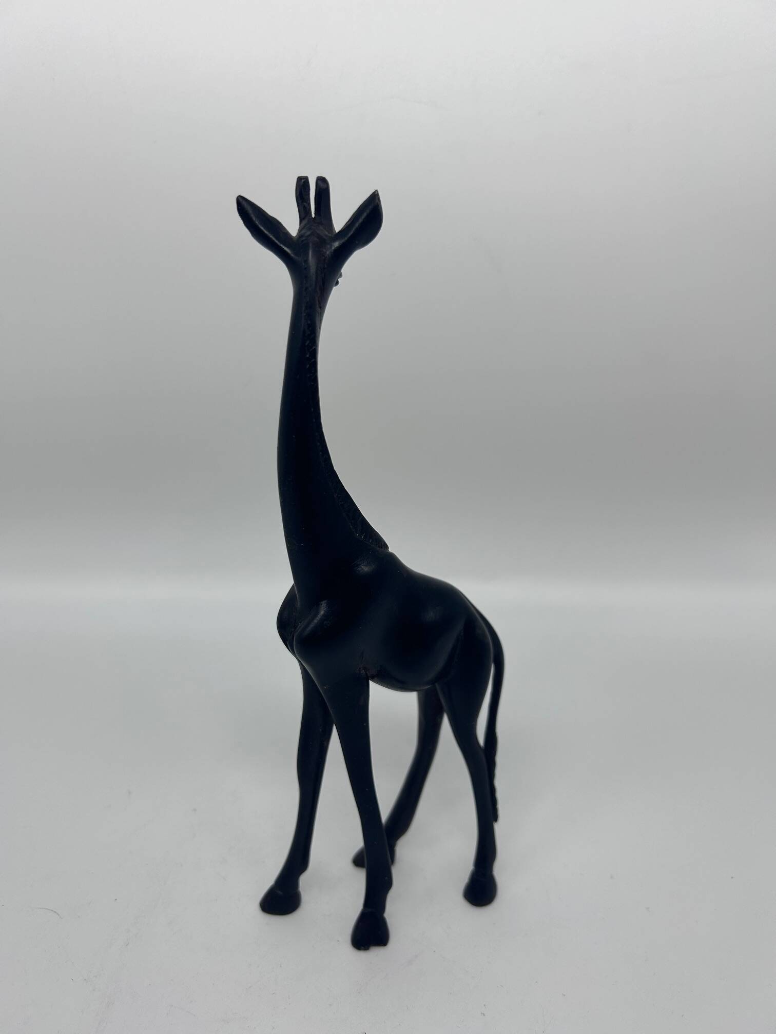 2 girafes en bois sculpté