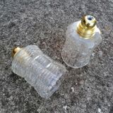 Duo of vintage molded glass globe pendant lights.