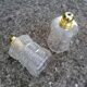 Duo of vintage molded glass globe pendant lights.