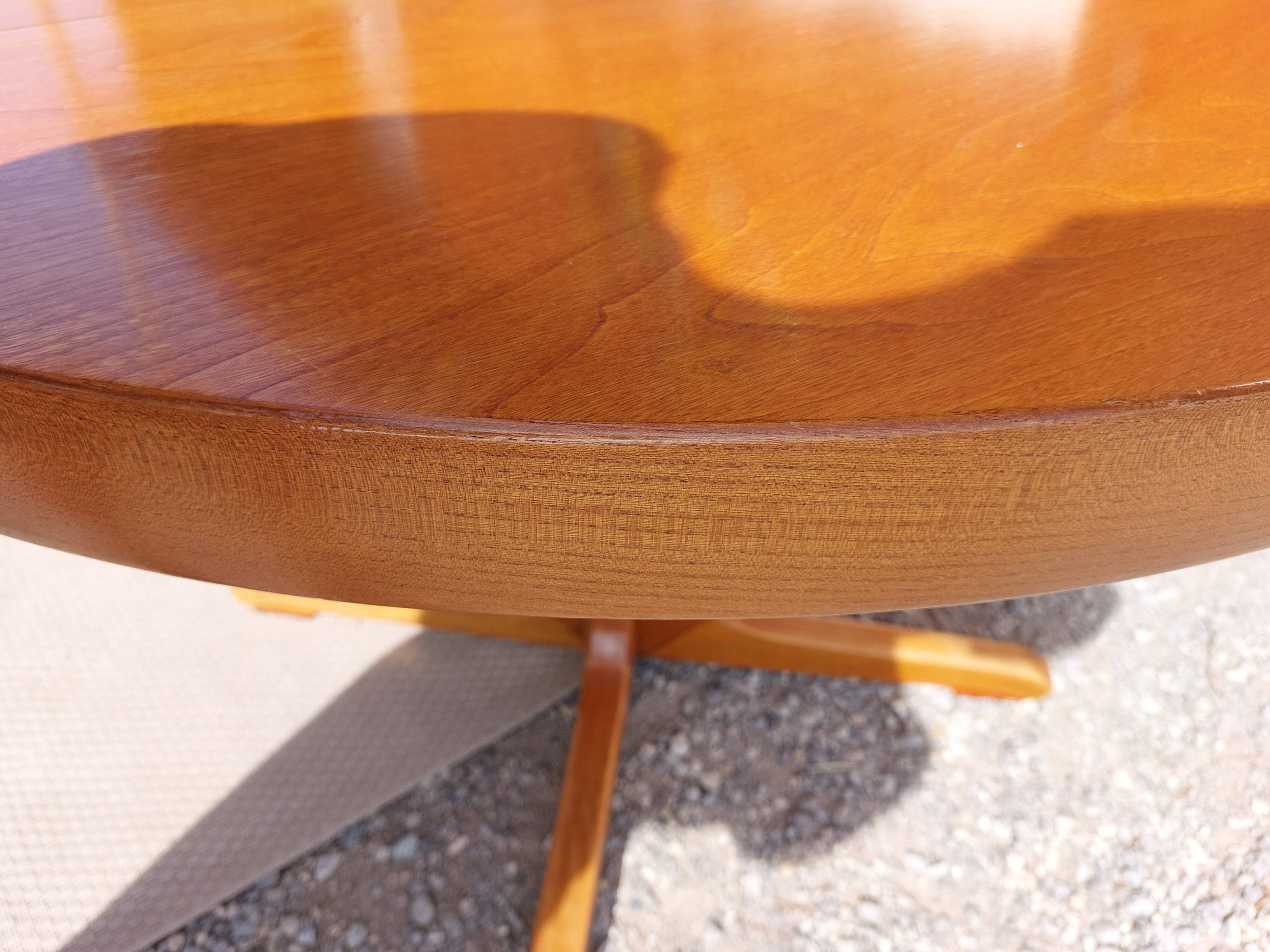 round or oval table with extension, central leg, vintage Baumann design