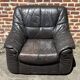 Pair of patinated leather club armchairs