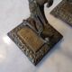 Pair of bronze chimera candlesticks