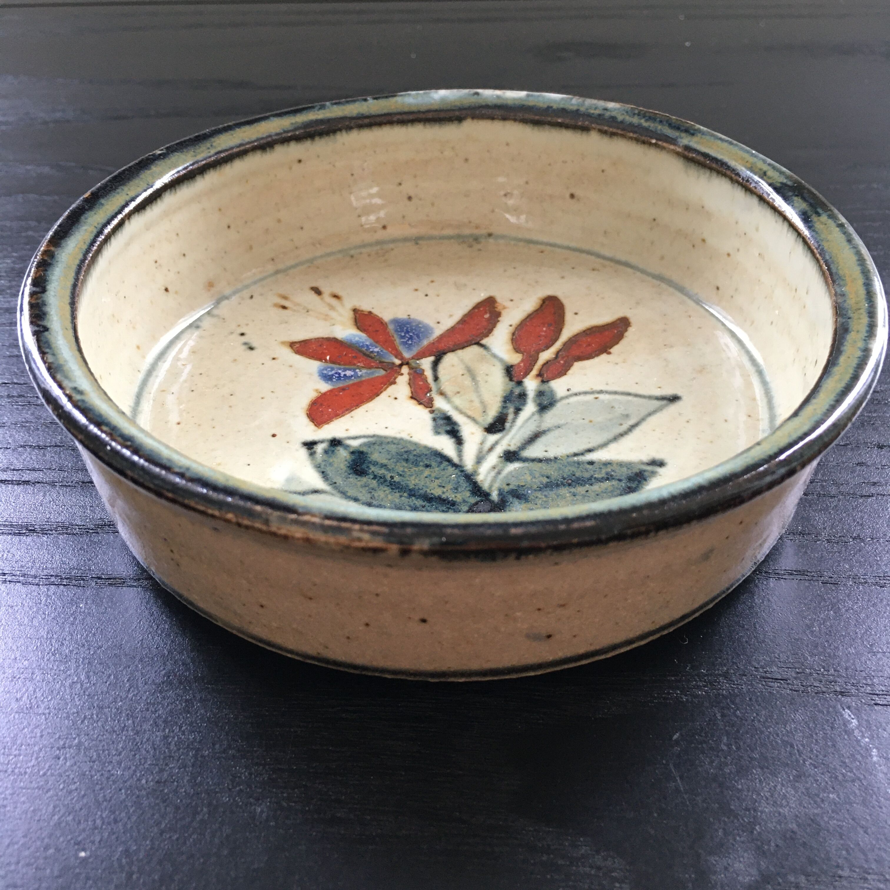 Floral decorated ramekin, signed