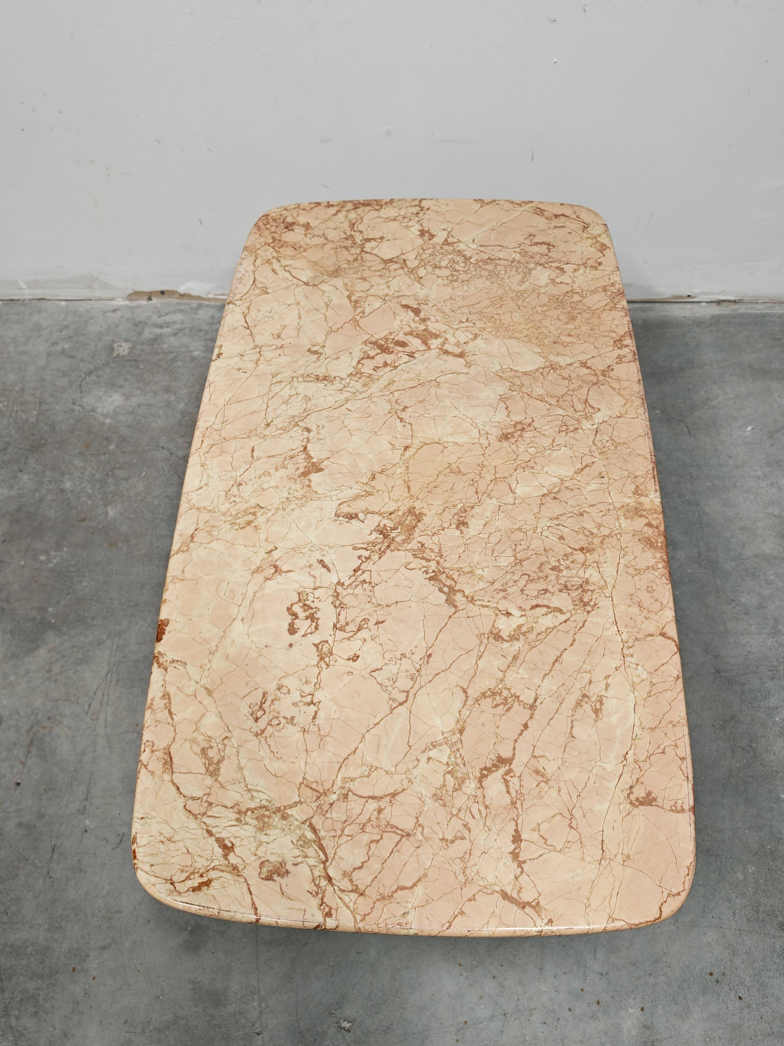 Mid-century modern coffee table in marble, brass, and wood, 1950s.