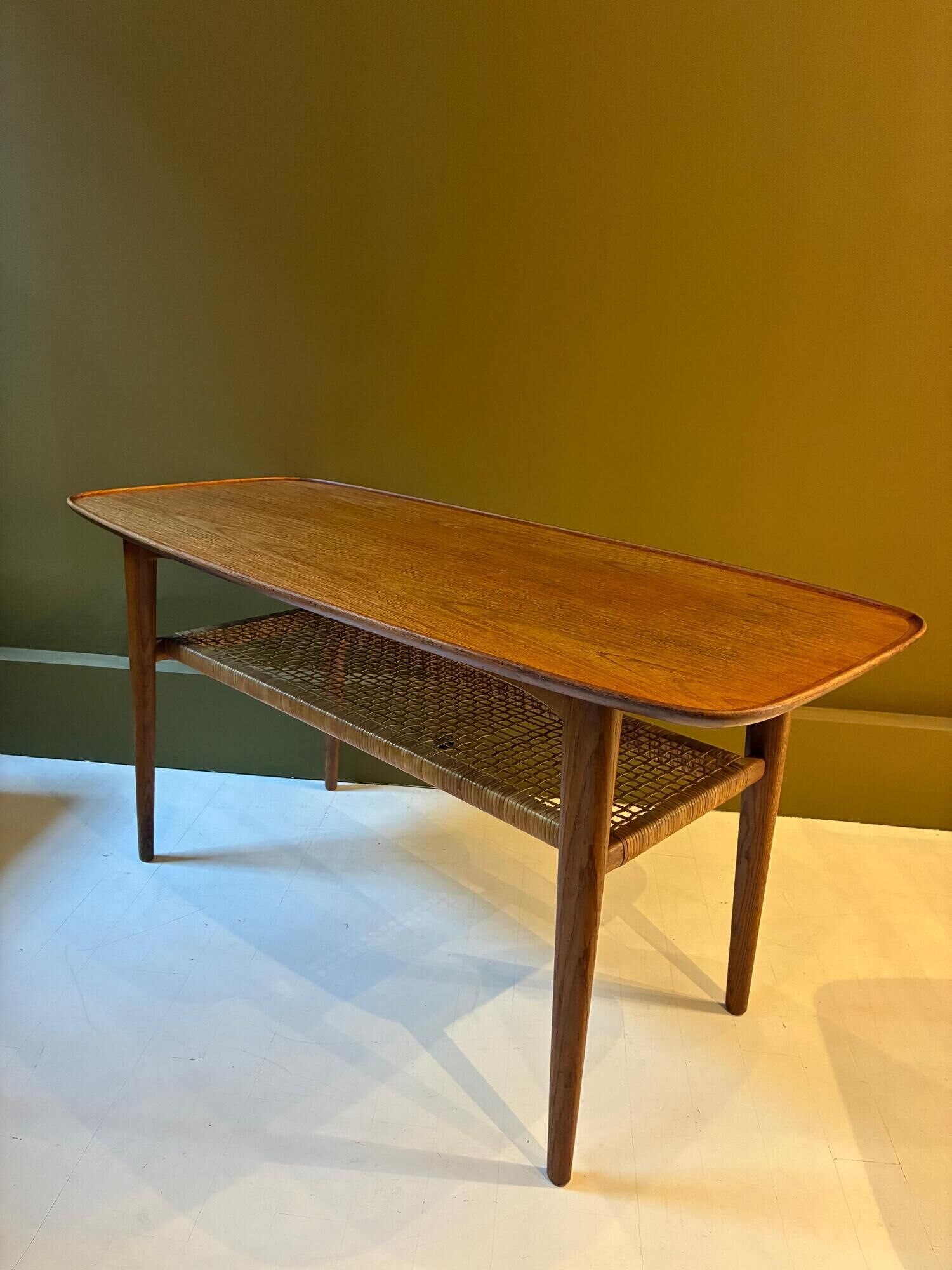 Teak and cane coffee table, 1970s.