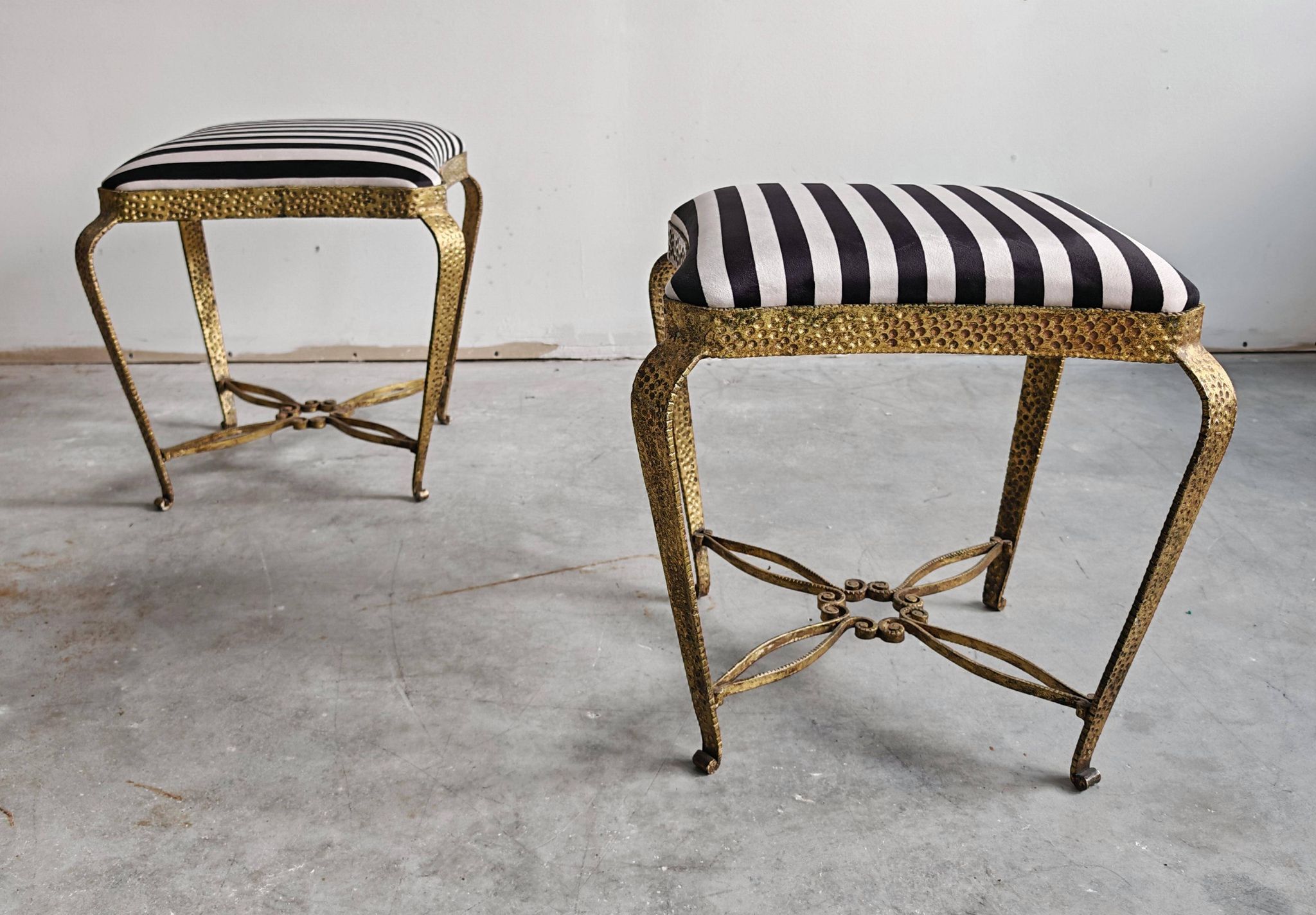 Pair of Mid Century Modern ottomans by Pier Luigi Colli from the 1950s.