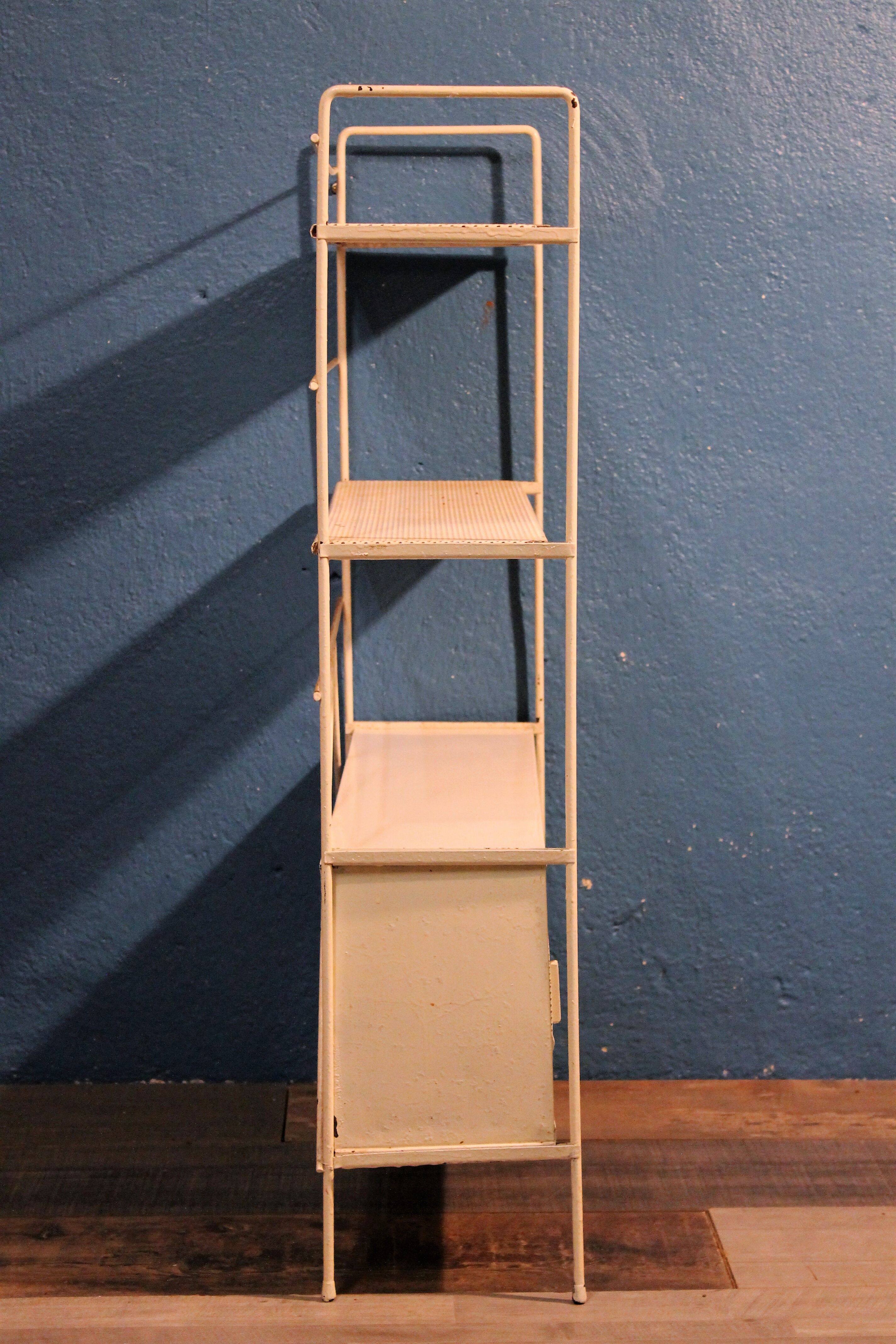 Perforated metal stand 1950