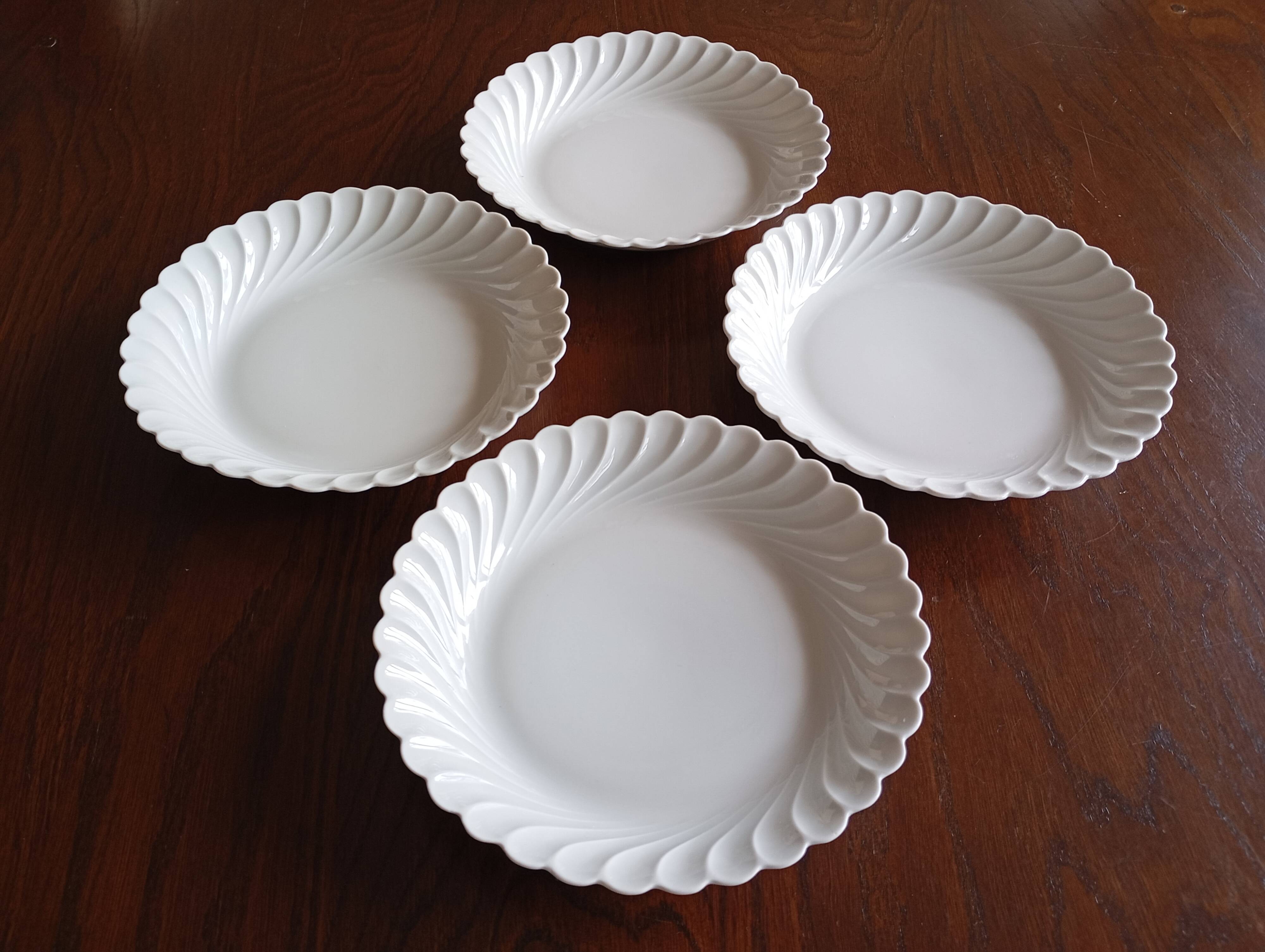 4 Haviland Torse soup plates