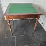 Old mahogany game table