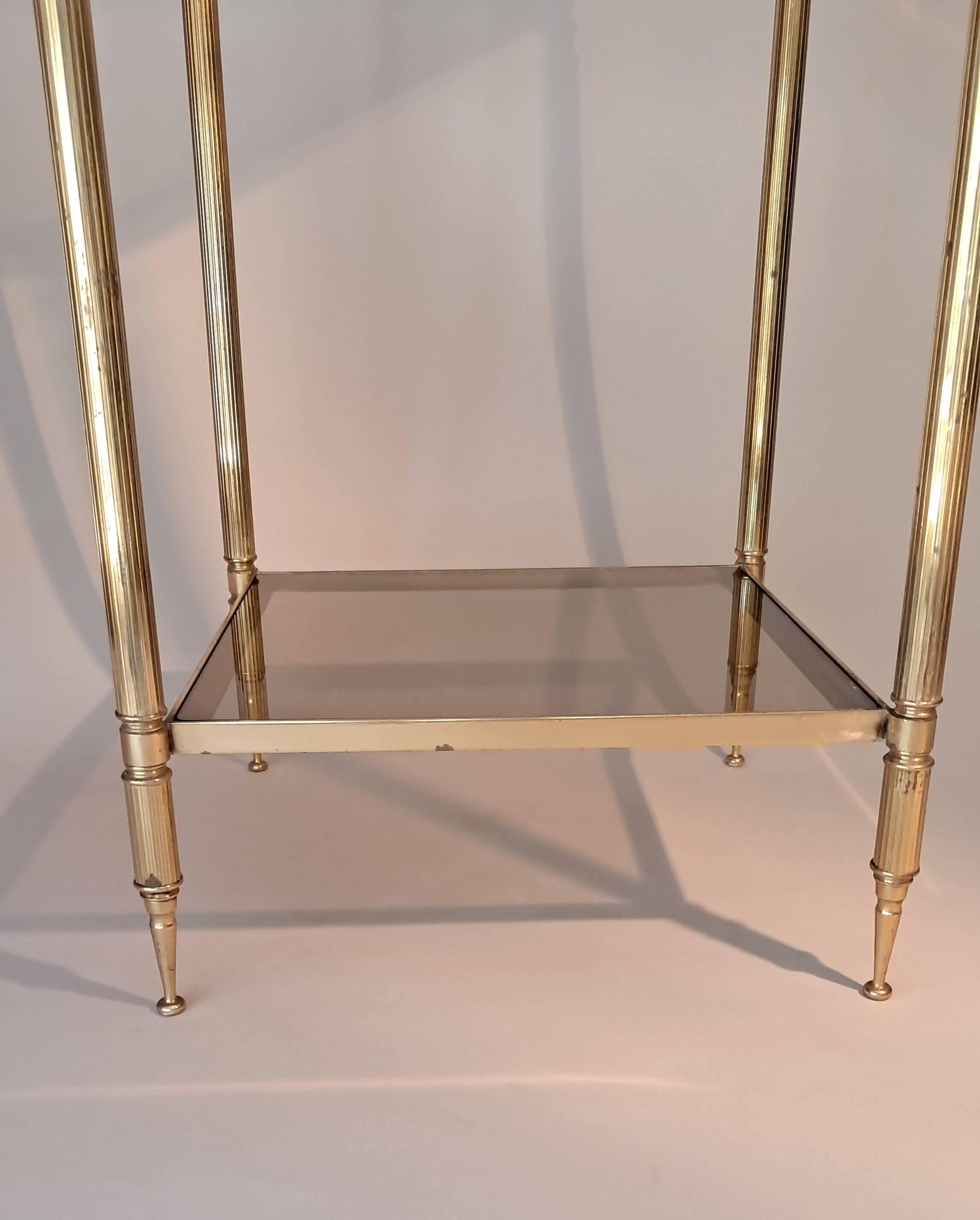 Gilded brass and smoked glass end table, 1960s.