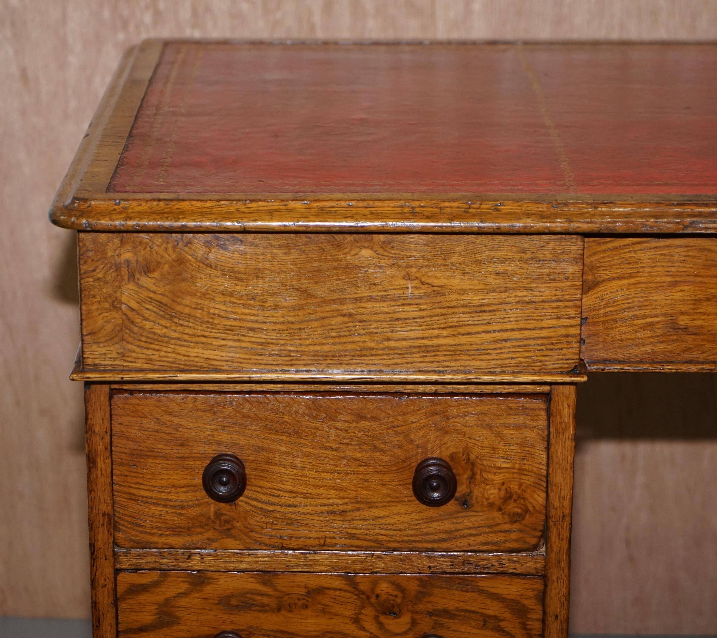 Rare oak partner's desk by Howard & Sons circa 1880 with leather.