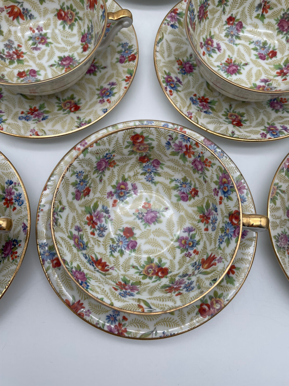 Set of 8 Limoges porcelain coffee cups from France with floral and gold pattern