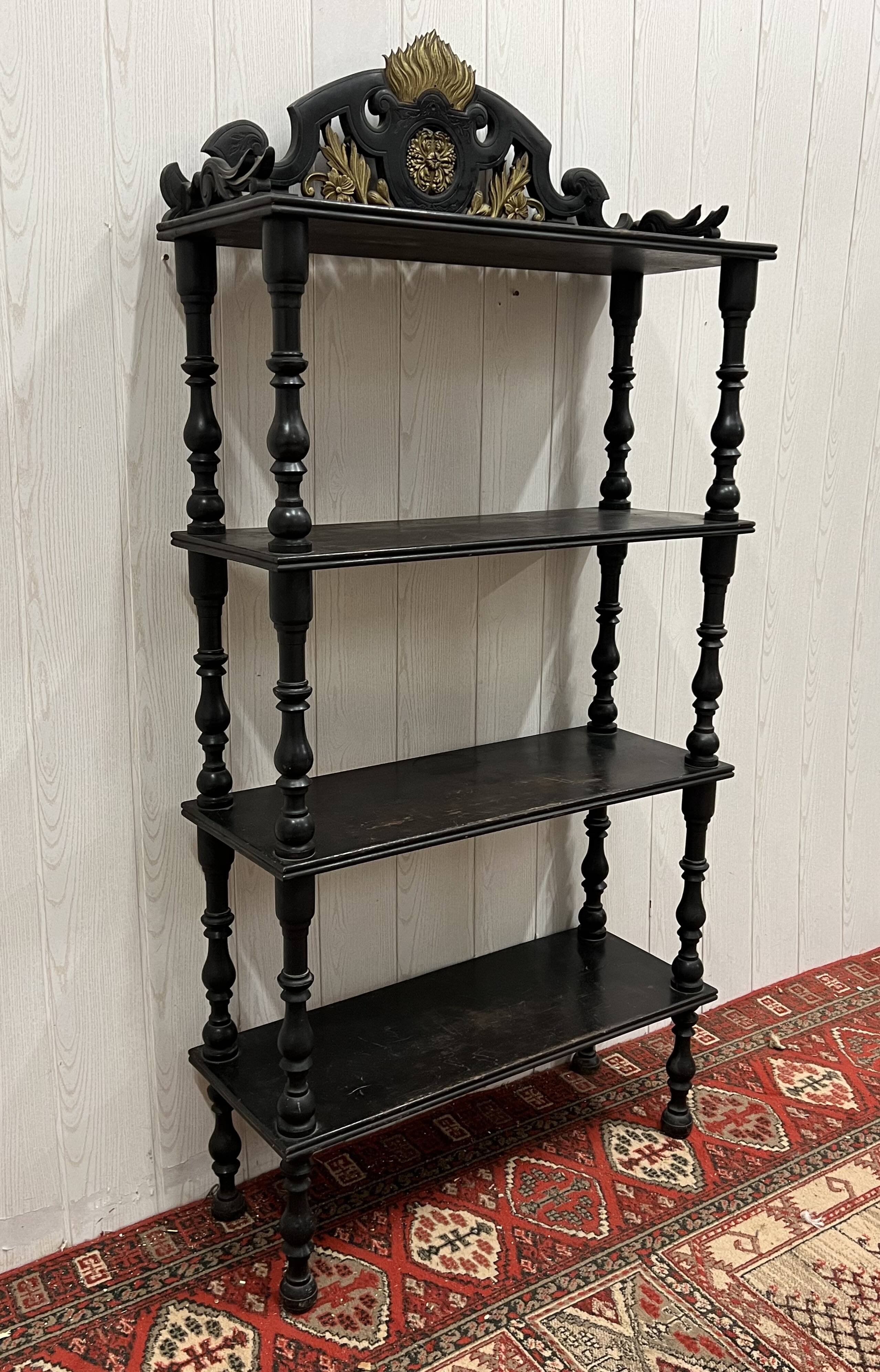 Blackened wooden shelf.