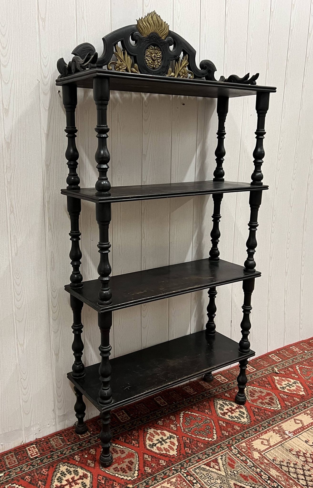 Blackened wooden shelf.