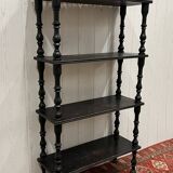 Blackened wooden shelf.