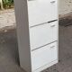 Scandinavian shoe cabinet with 3 beige wooden compartments from the 80s