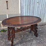 Asian table, mid-height, made of exotic wood.