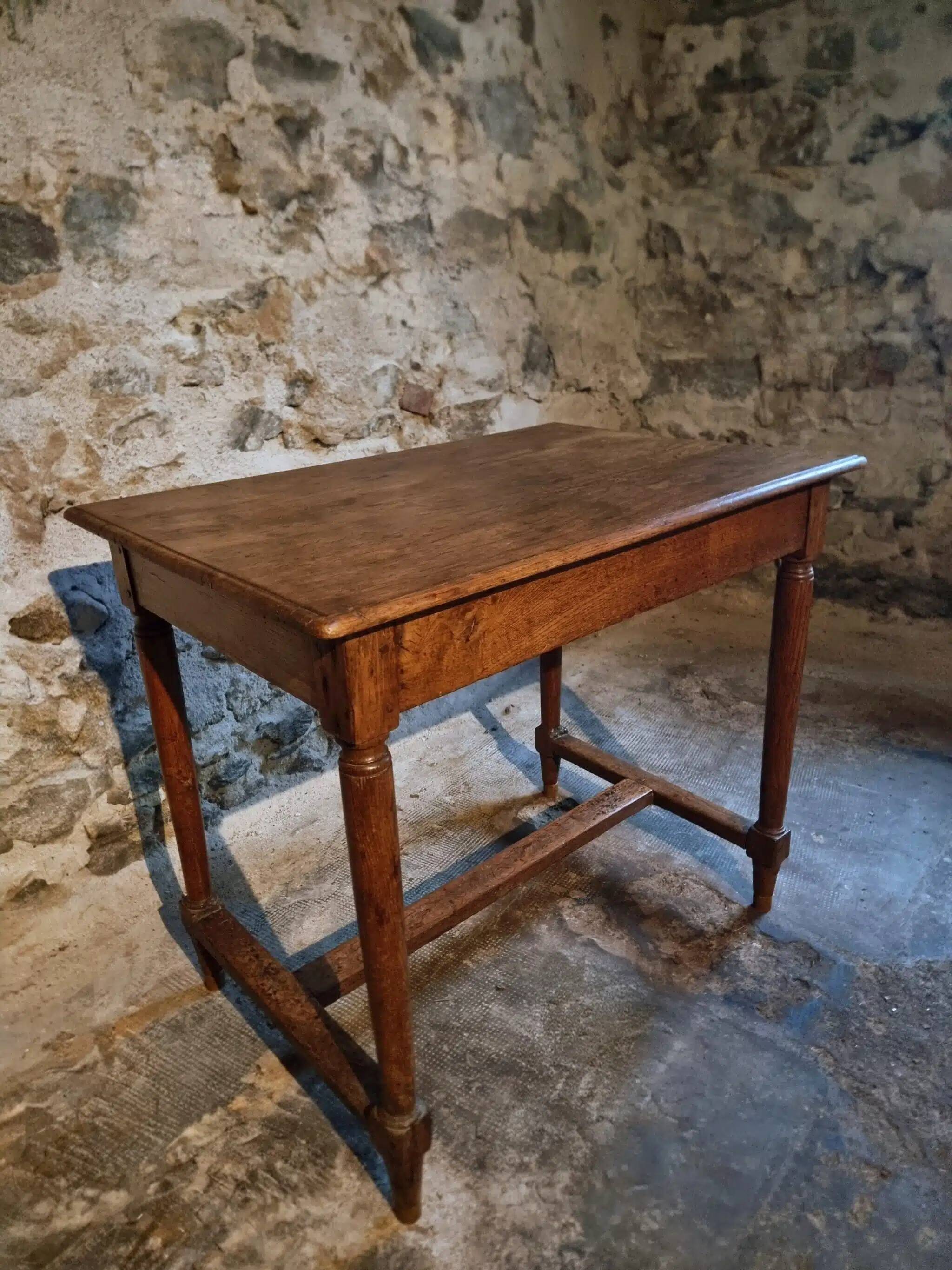 Antique French oak table, writing table from the early 19th century.
