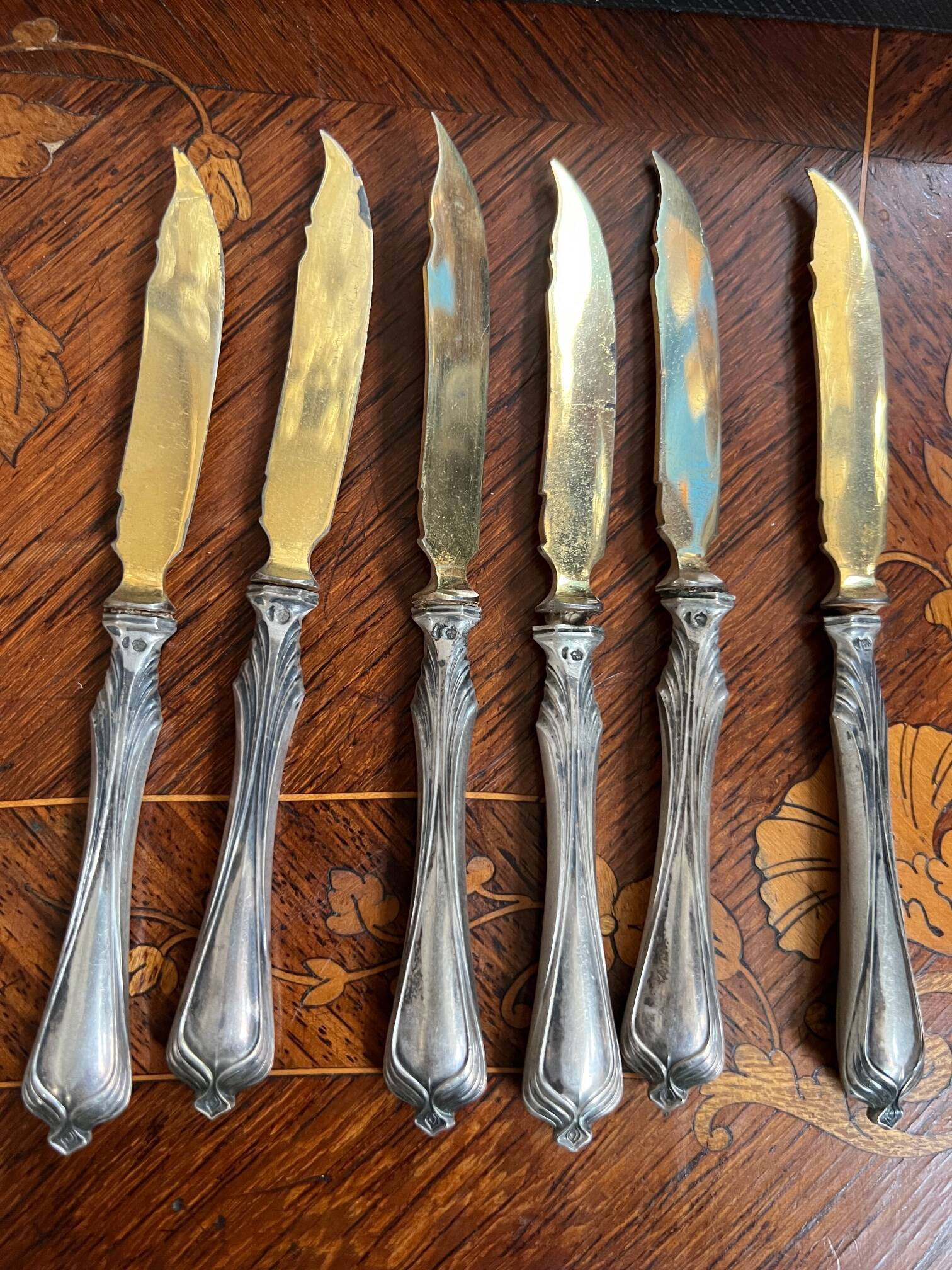 Set of knives and forks for fruits.