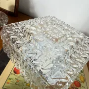 Old small square wall light ceiling fixture with transparent vintage glass.