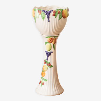 Old ceramic column and its fruit slip pot cover