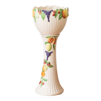 Old ceramic column and its fruit slip pot cover