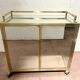 1970s brass bar with a mirrored front from the 20th century.