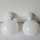 Duo of art deco wall lamps in porcelain and opaline