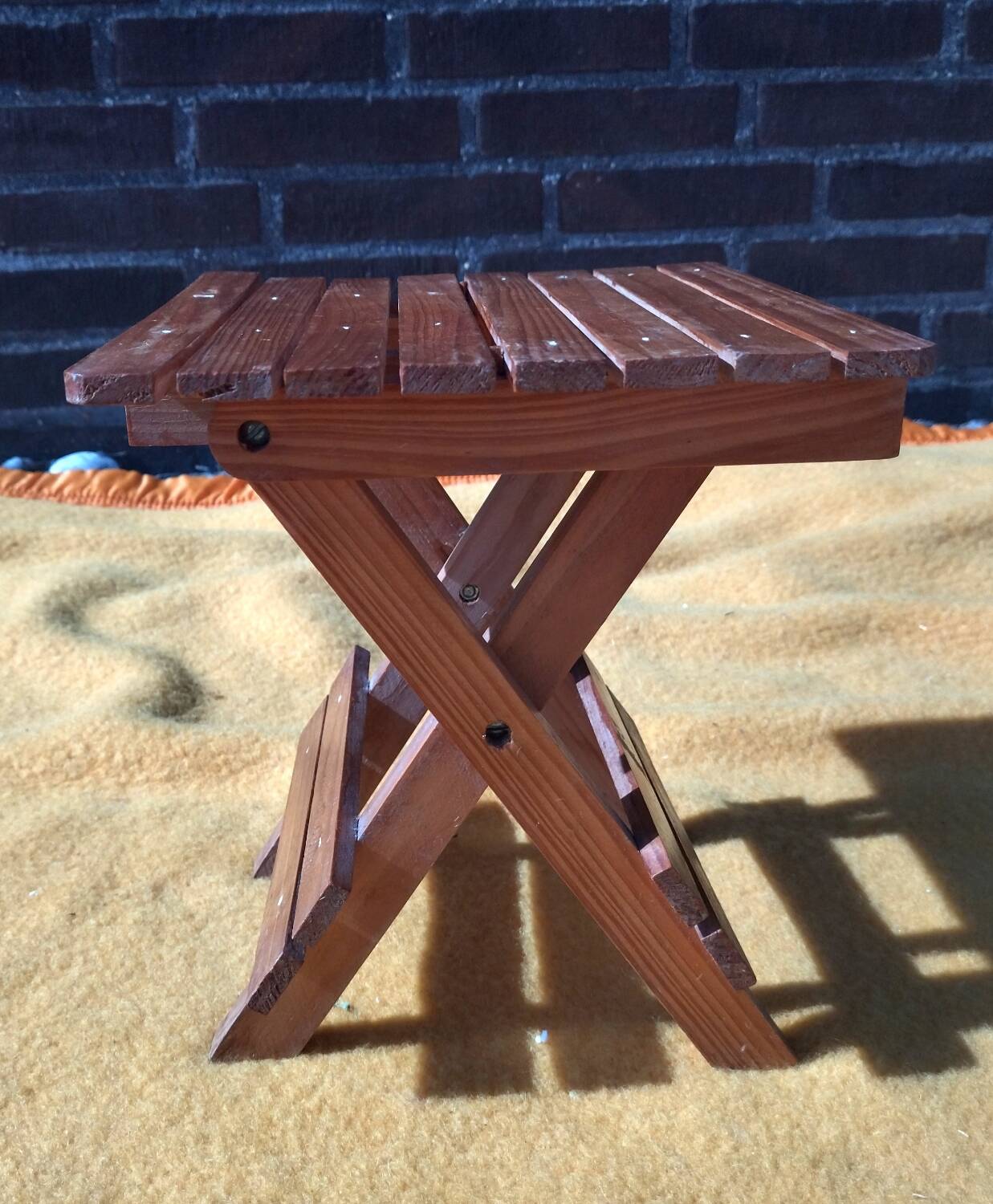 Foldable stool/plant holder