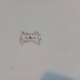 Old round earthenware dish from kg luneville with brown floral decoration