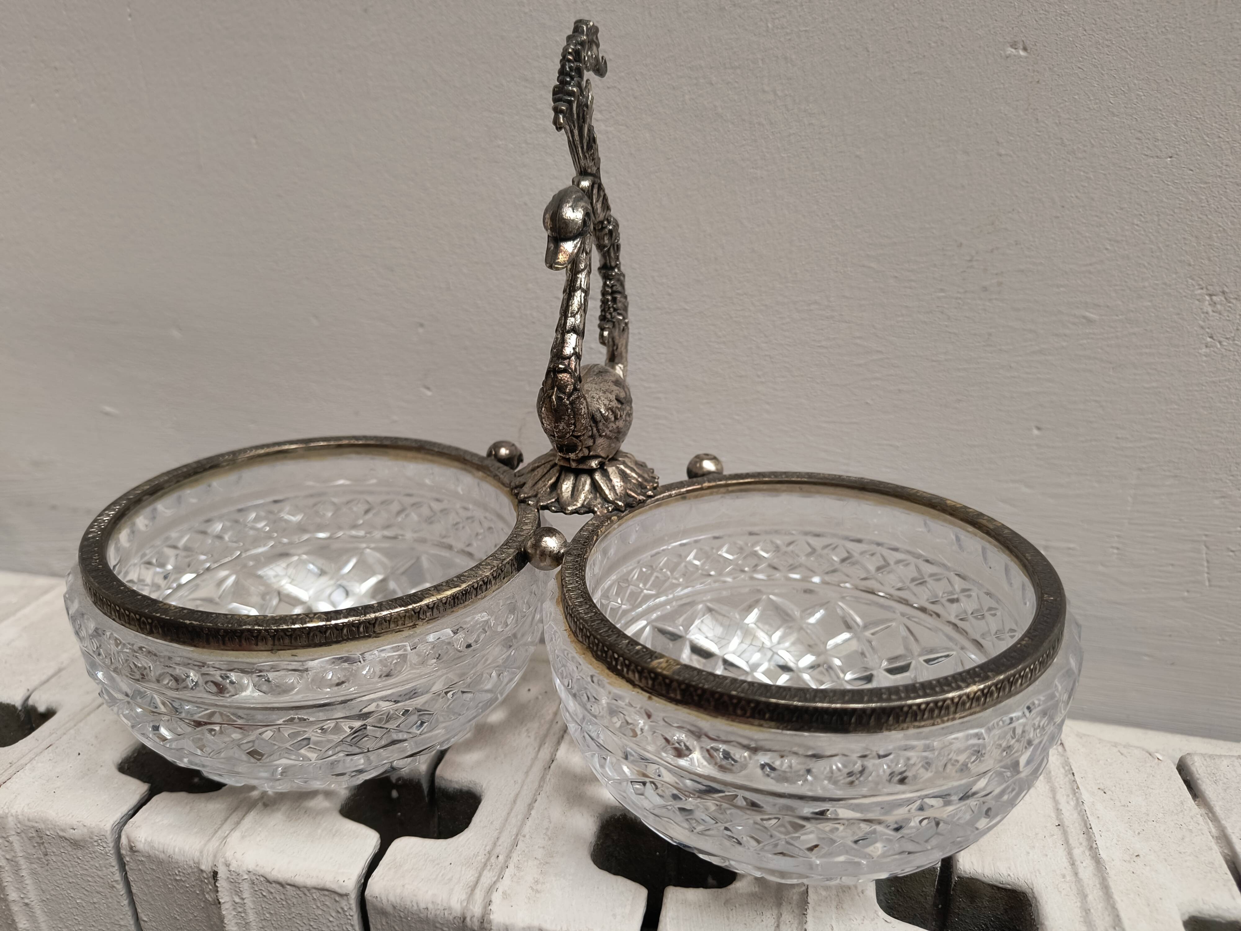 Crystal bowls joined by "swan neck" creation.