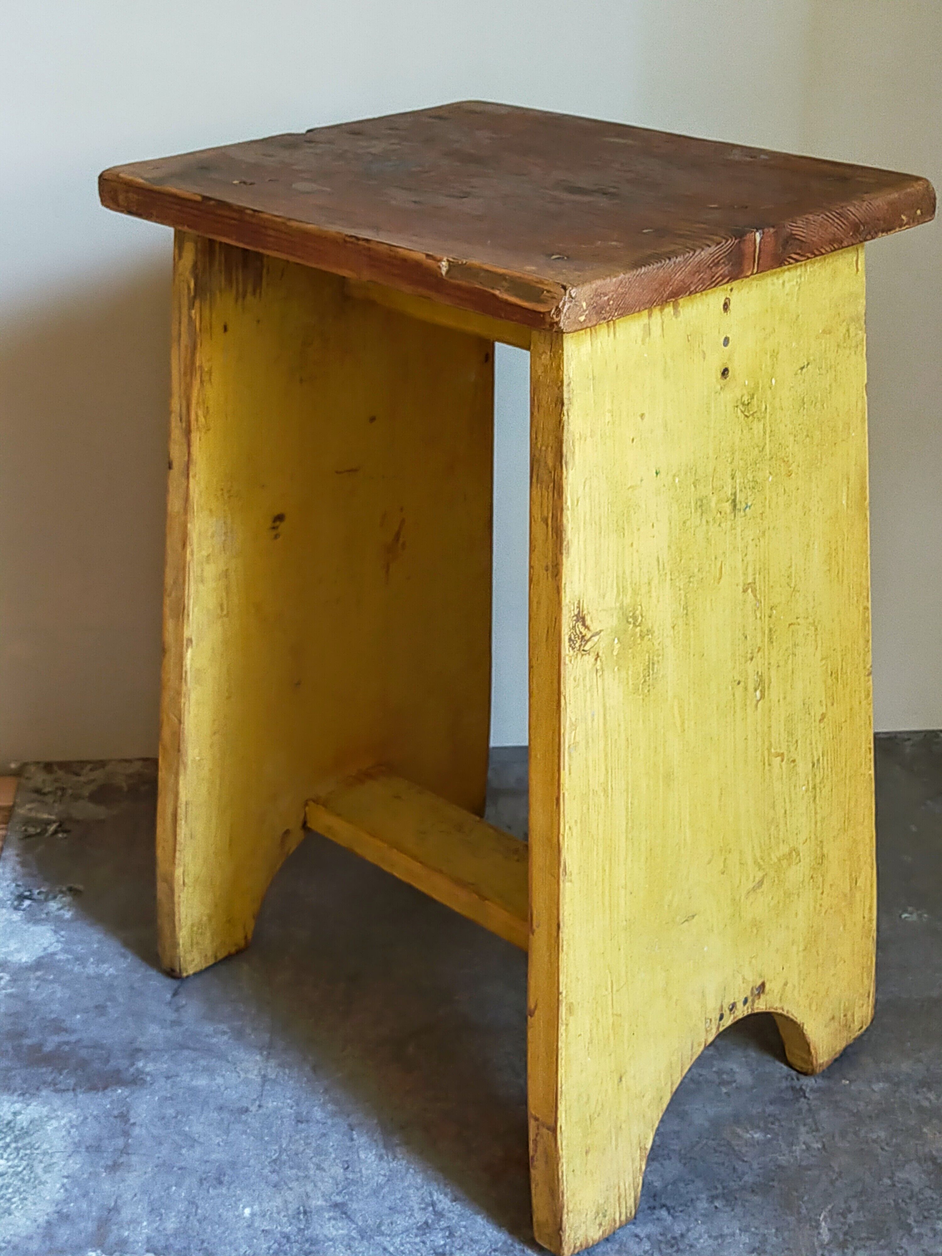 Art-populaire workshop stool in patinated painted wood