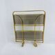 Mid-century modern folding bar cart in brass and ribbed acrylic glass, 1970s