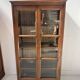 Pair of display cabinets in solid cherry wood from the 19th century.