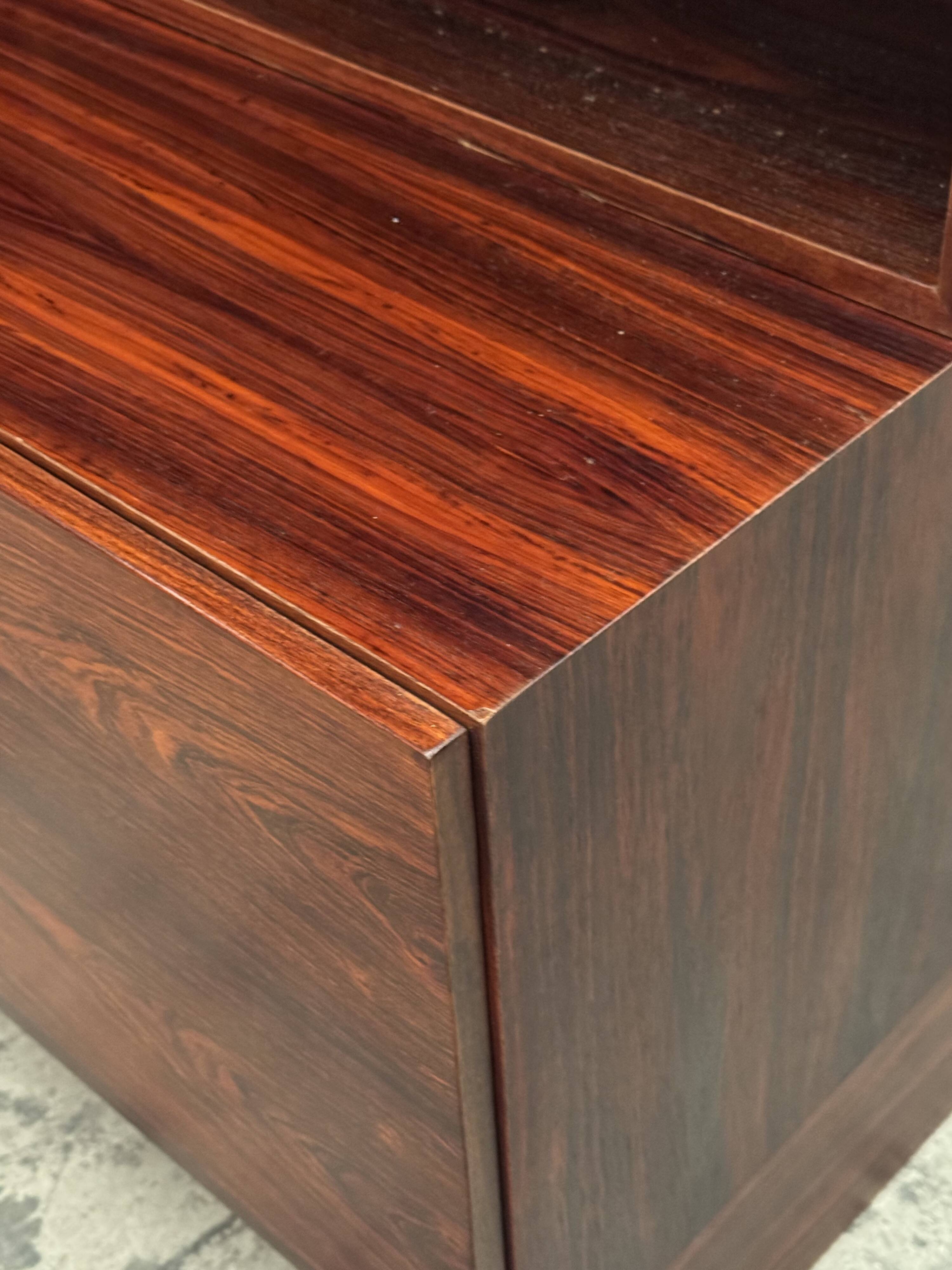 Scandinavian library in rosewood designed by Ib Kofod Larsen.