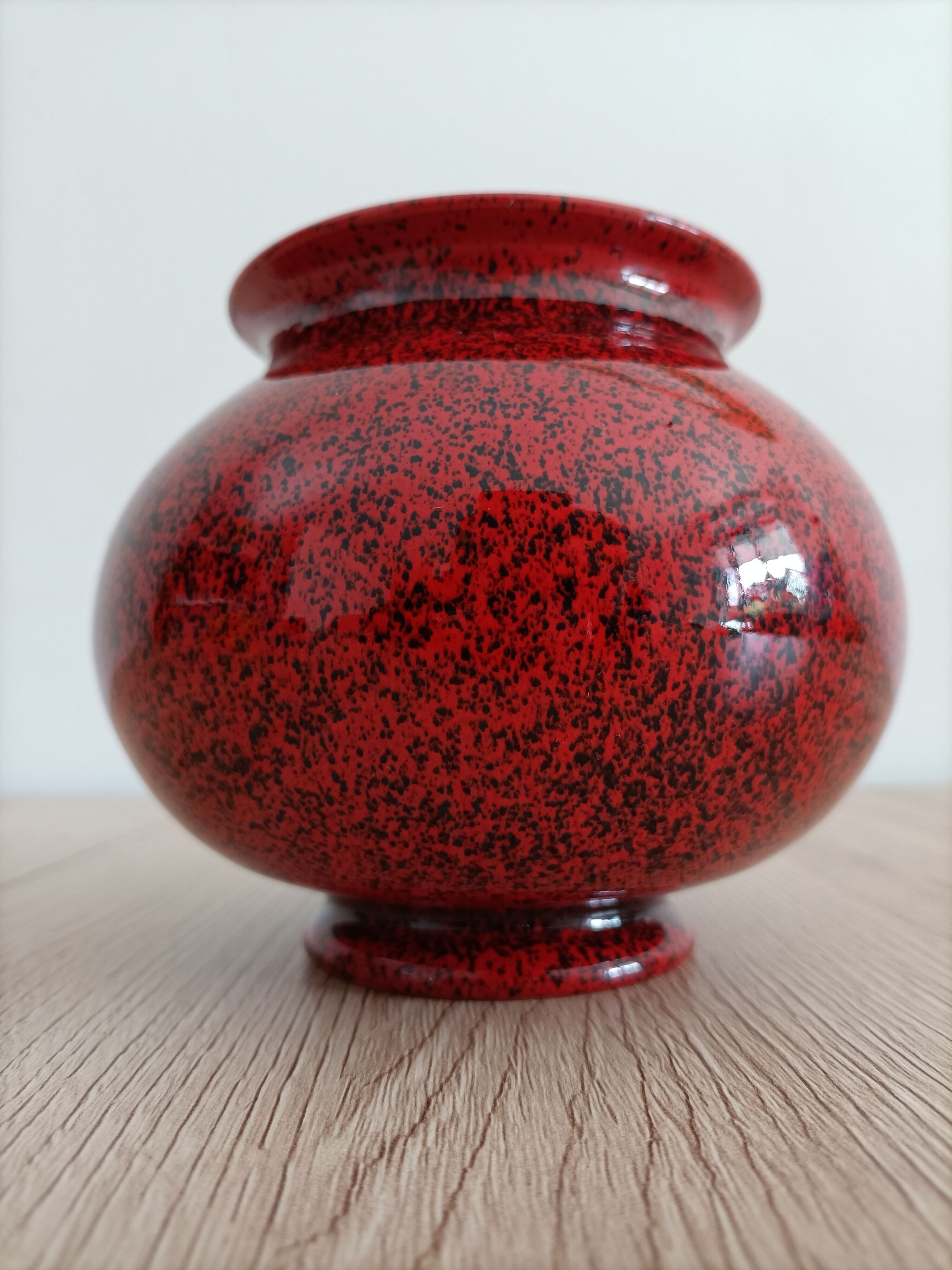 Red and black ceramic vase or pot cover
