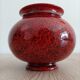 Red and black ceramic vase or pot cover