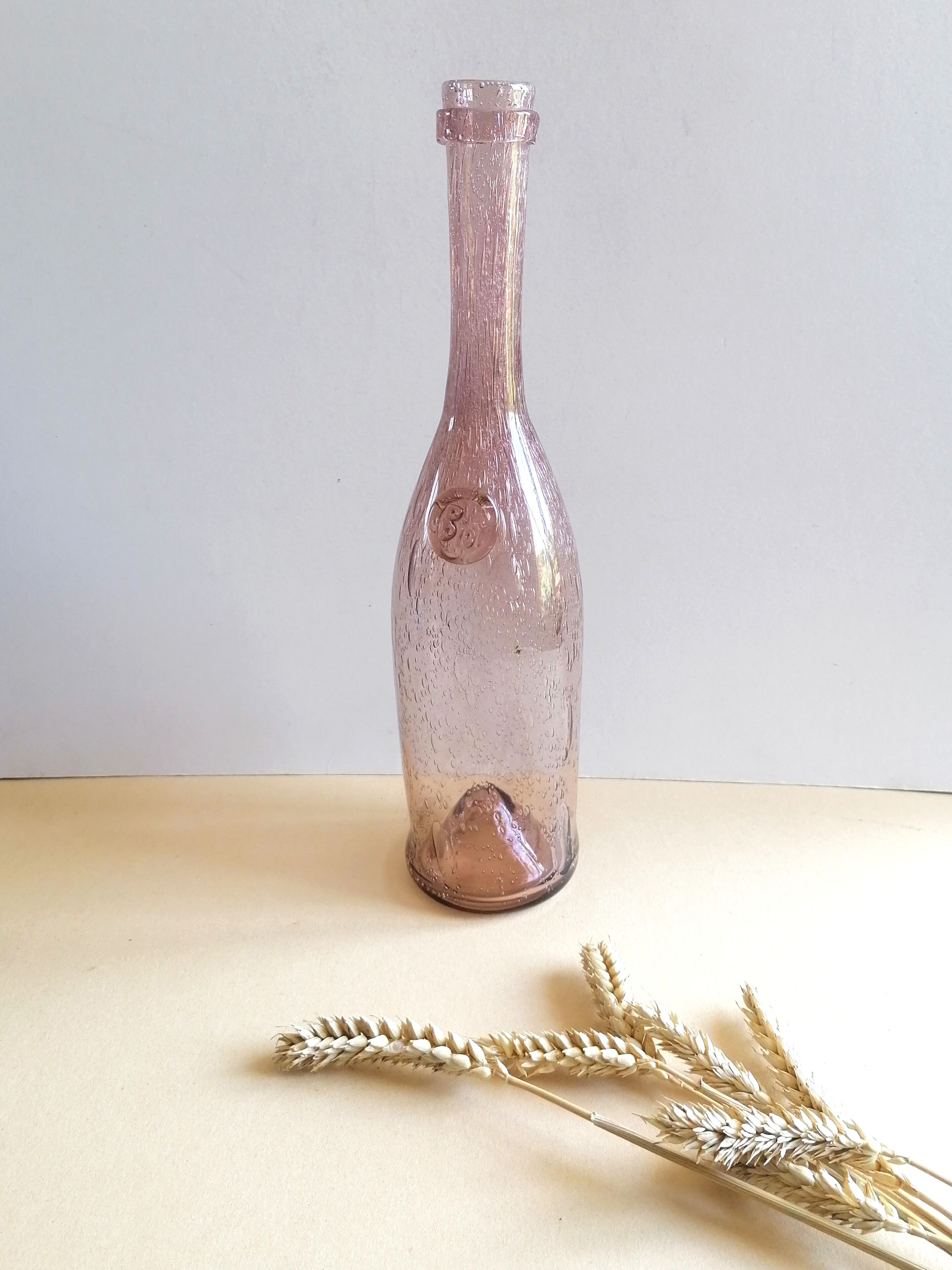 Biot bubble glass bottle