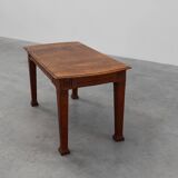 Oak Art Deco dining table with carved frieze, France 1920s