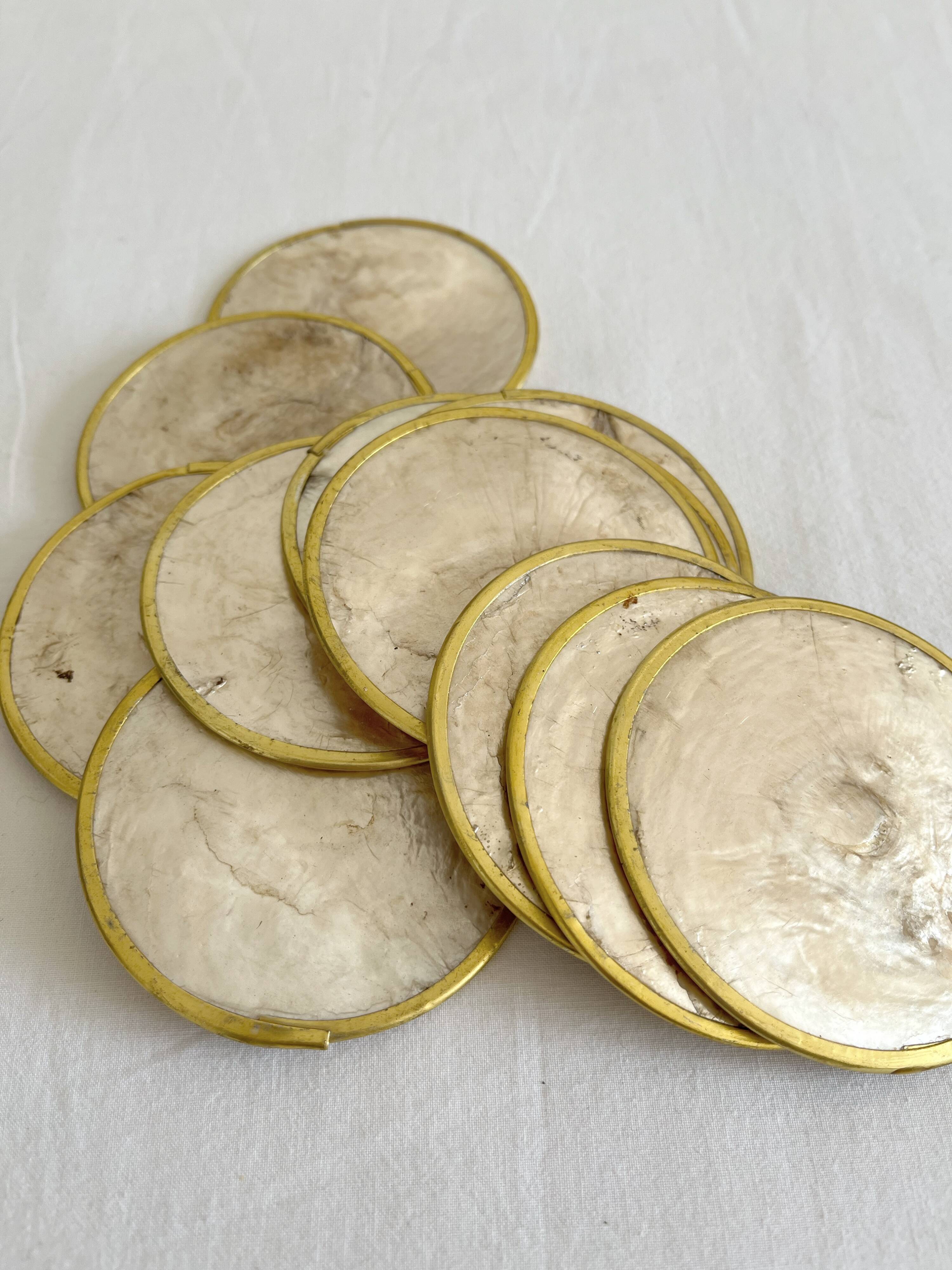 12 coasters in mother-of-pearl and vintage brass